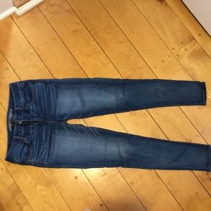 medium wash, super stretch, never been worn